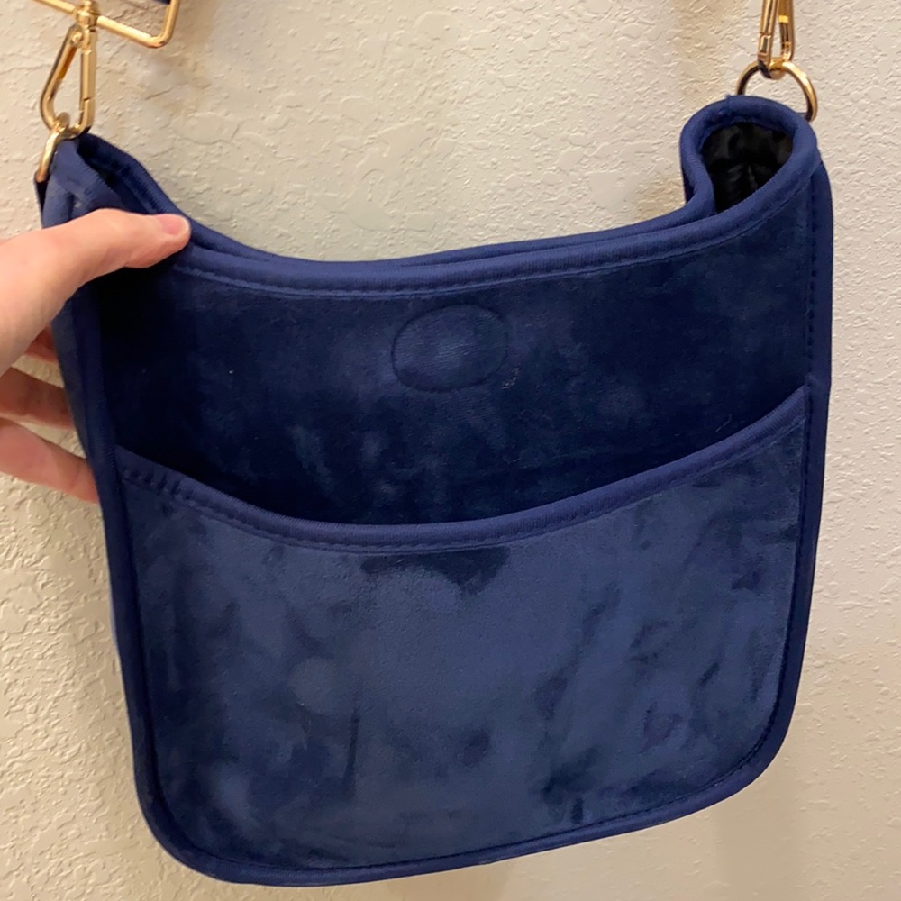 Ah-adorned crossbody bag